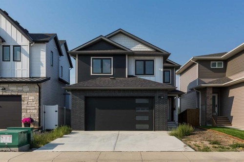 561 Malahat Green West, Lethbridge, AB - Outdoor With Facade