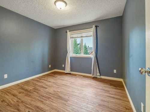34 Heritage Green West, Lethbridge, AB - Indoor Photo Showing Other Room