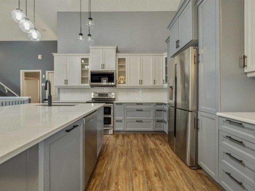 34 Heritage Green West, Lethbridge, AB - Indoor Photo Showing Kitchen With Upgraded Kitchen