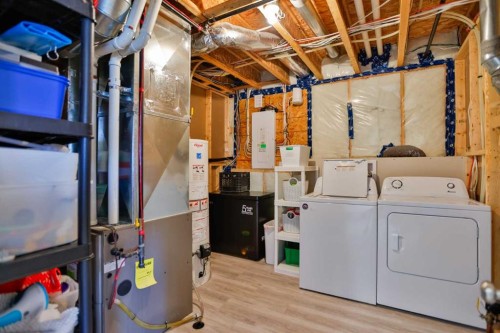 1002 Alice Birch Point North, Lethbridge, AB - Indoor Photo Showing Laundry Room