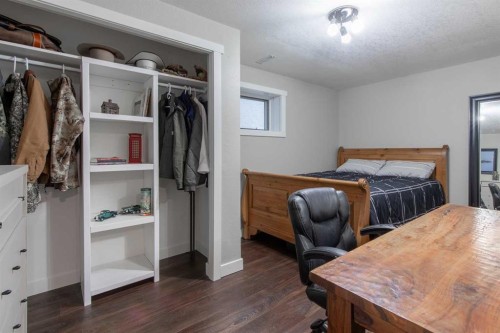 80 N 250 E, Raymond, AB - Indoor Photo Showing Bedroom