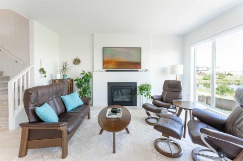 244 Blackwolf Place North, Lethbridge, AB - Indoor Photo Showing Living Room With Fireplace