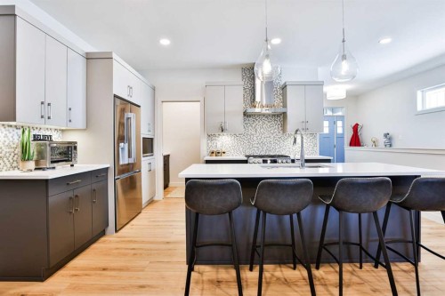 556 Riverhills Way West, Lethbridge, AB - Indoor Photo Showing Kitchen With Stainless Steel Kitchen With Upgraded Kitchen