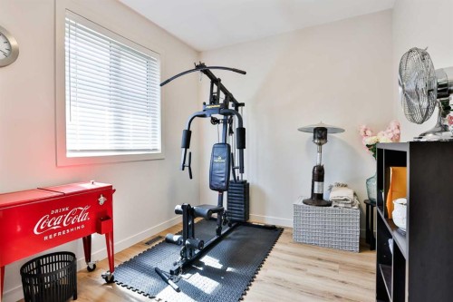 556 Riverhills Way West, Lethbridge, AB - Indoor Photo Showing Gym Room