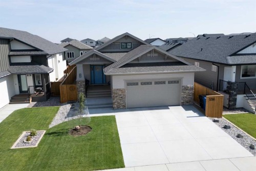 556 Riverhills Way West, Lethbridge, AB - Outdoor With Facade