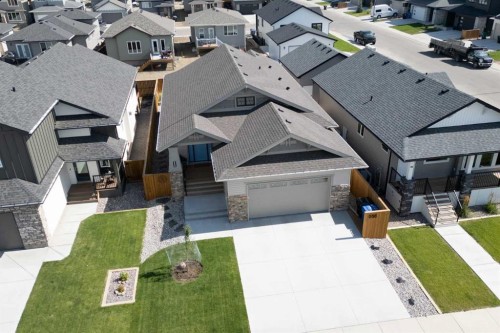 556 Riverhills Way West, Lethbridge, AB - Outdoor With Facade