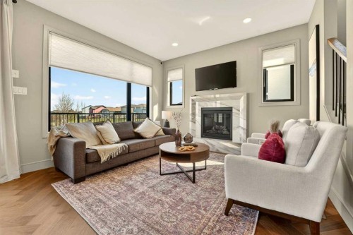 51 Miners Road West, Lethbridge, AB - Indoor Photo Showing Living Room With Fireplace