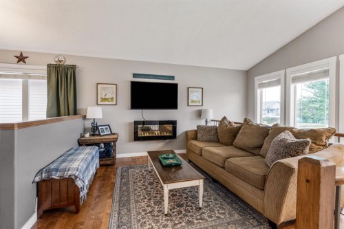 135 Fairmont Point South, Lethbridge, AB - Indoor Photo Showing Living Room With Fireplace