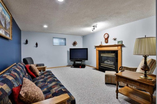 3802 Oak Drive South, Lethbridge, AB - Indoor With Fireplace