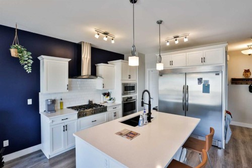 630 Moonlight Lane West, Lethbridge, AB - Indoor Photo Showing Kitchen With Stainless Steel Kitchen With Double Sink With Upgraded Kitchen