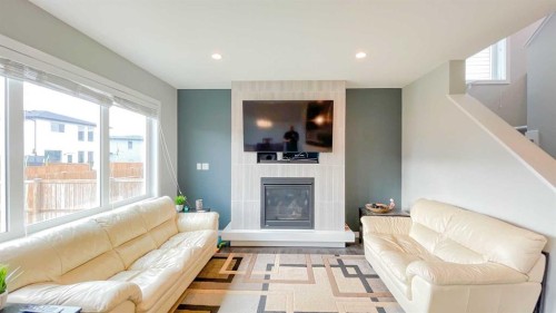 291 Northlander Bend West, Lethbridge, AB - Indoor Photo Showing Living Room With Fireplace