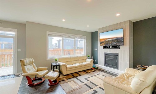 291 Northlander Bend West, Lethbridge, AB - Indoor Photo Showing Living Room With Fireplace