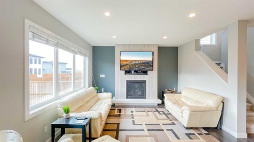 291 Northlander Bend West, Lethbridge, AB - Indoor Photo Showing Living Room With Fireplace