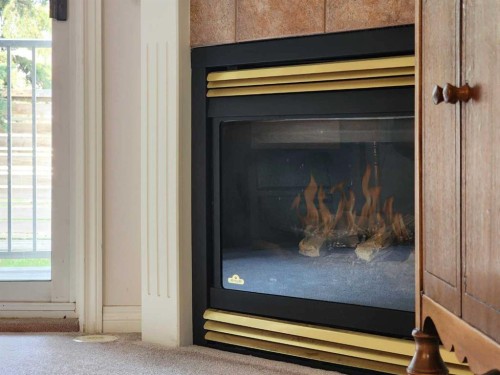 102-6 Skyline Crescent, Claresholm, AB - Indoor With Fireplace