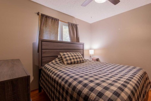 63009 Rr 210, Raymond, AB - Indoor Photo Showing Bedroom
