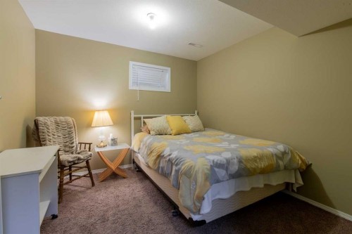 63009 Rr 210, Raymond, AB - Indoor With Fireplace