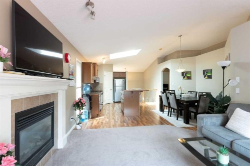 27 Fairmont Road South, Lethbridge, AB - Indoor Photo Showing Living Room With Fireplace