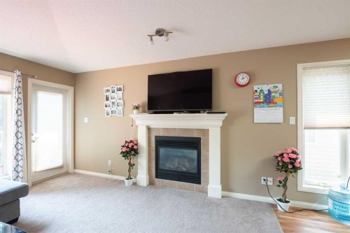 27 Fairmont Road South, Lethbridge, AB - Indoor Photo Showing Living Room With Fireplace