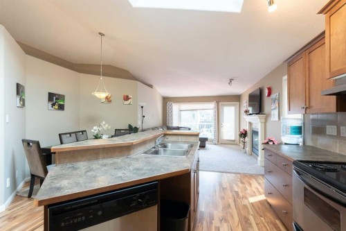 27 Fairmont Road South, Lethbridge, AB - Indoor Photo Showing Kitchen With Double Sink