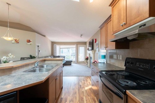 27 Fairmont Road South, Lethbridge, AB - Indoor Photo Showing Kitchen With Double Sink