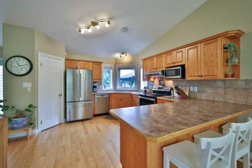 135 Riverbrook Close West, Lethbridge, AB - Indoor Photo Showing Kitchen With Double Sink