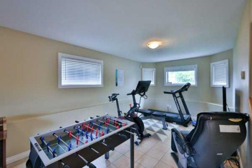 135 Riverbrook Close West, Lethbridge, AB - Indoor Photo Showing Gym Room