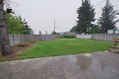 102 1 Avenue, Burdett, AB - Outdoor With Backyard