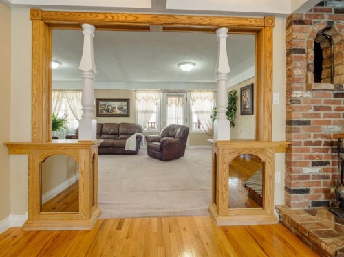 510 3 Street West, Cardston, AB - Indoor Photo Showing Other Room With Fireplace
