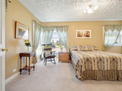 510 3 Street West, Cardston, AB - Indoor Photo Showing Bedroom