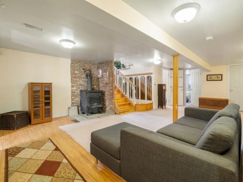 510 3 Street West, Cardston, AB - Indoor Photo Showing Living Room With Fireplace