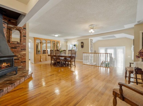 510 3 Street West, Cardston, AB - Indoor Photo Showing Living Room With Fireplace