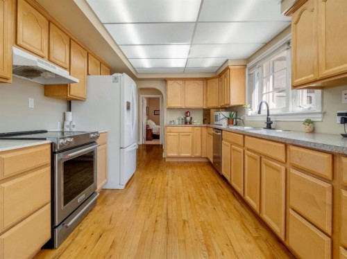 510 3 Street West, Cardston, AB - Indoor Photo Showing Kitchen With Double Sink