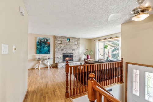 11 Rutgers Crescent West, Lethbridge, AB - Indoor With Fireplace