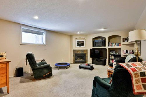 54 Rivercrest Court West, Lethbridge, AB - Indoor With Fireplace
