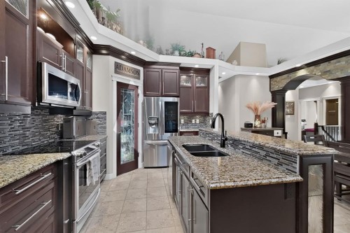 250 Riverstone Boulevard West, Lethbridge, AB - Indoor Photo Showing Kitchen With Double Sink With Upgraded Kitchen