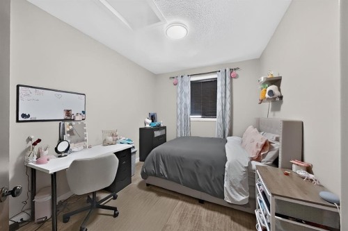 250 Riverstone Boulevard West, Lethbridge, AB - Indoor Photo Showing Bedroom