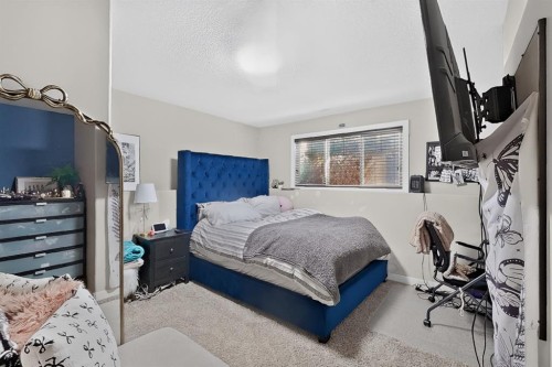 250 Riverstone Boulevard West, Lethbridge, AB - Indoor Photo Showing Bedroom