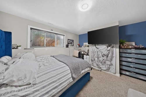 250 Riverstone Boulevard West, Lethbridge, AB - Indoor Photo Showing Bedroom
