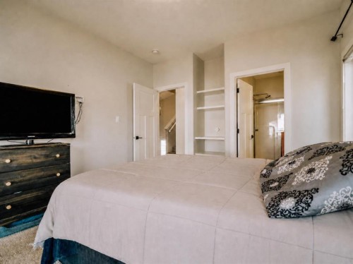 1369 Pacific Circle West, Lethbridge, AB - Indoor Photo Showing Bedroom