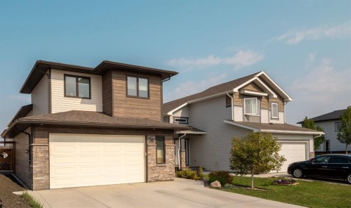 1369 Pacific Circle West, Lethbridge, AB - Outdoor With Facade