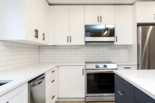 1418 25 Avenue North, Lethbridge, AB - Indoor Photo Showing Kitchen With Upgraded Kitchen