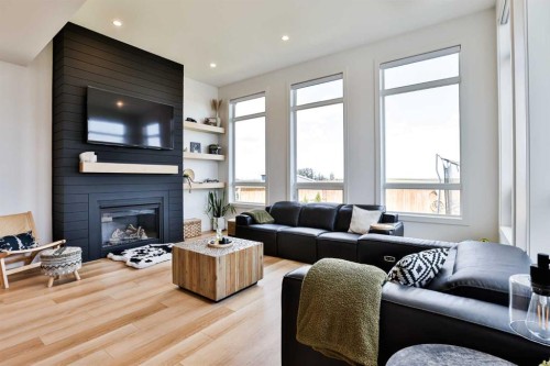 4241 60 Avenue, Taber, AB - Indoor Photo Showing Living Room With Fireplace