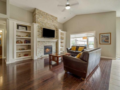 43 Riverine Lane West, Lethbridge, AB - Indoor Photo Showing Living Room With Fireplace