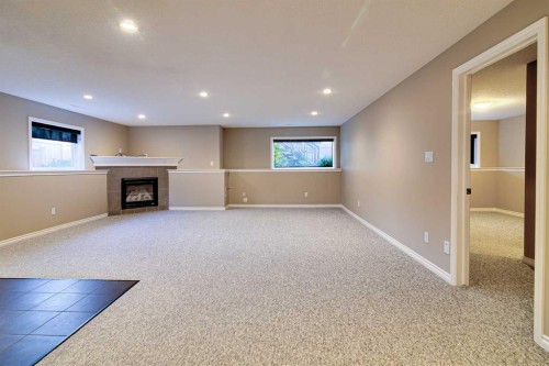 544 Couleesprings Crescent South, Lethbridge, AB - Indoor With Fireplace