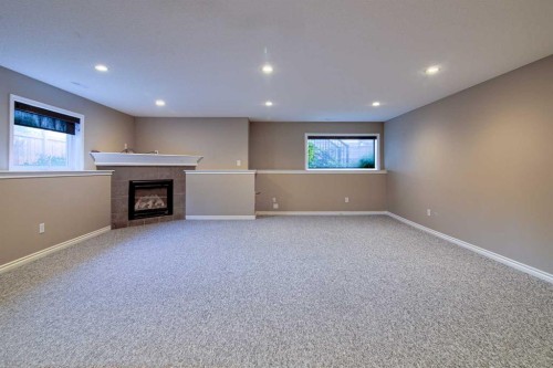 544 Couleesprings Crescent South, Lethbridge, AB - Indoor With Fireplace