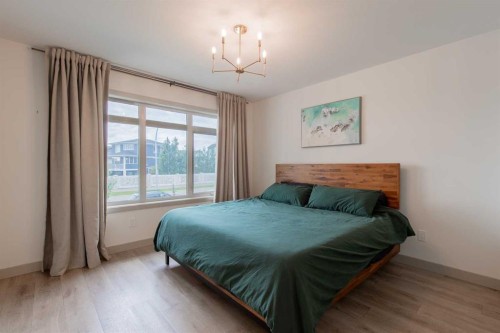 403 Caledonia Boulevard West, Lethbridge, AB - Indoor Photo Showing Bedroom