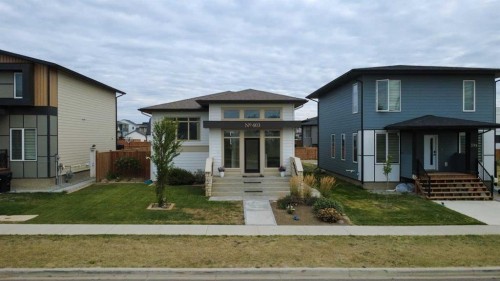 403 Caledonia Boulevard West, Lethbridge, AB - Outdoor With Facade