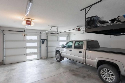 2006 30A Avenue, Coaldale, AB - Indoor Photo Showing Garage