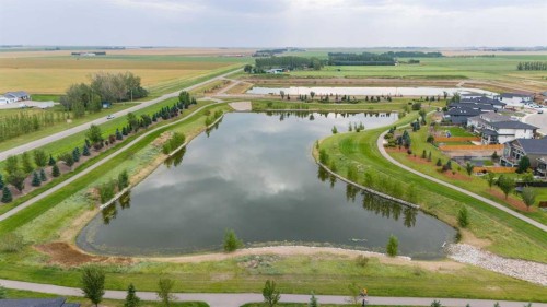 2006 30A Avenue, Coaldale, AB - Outdoor With Body Of Water With View