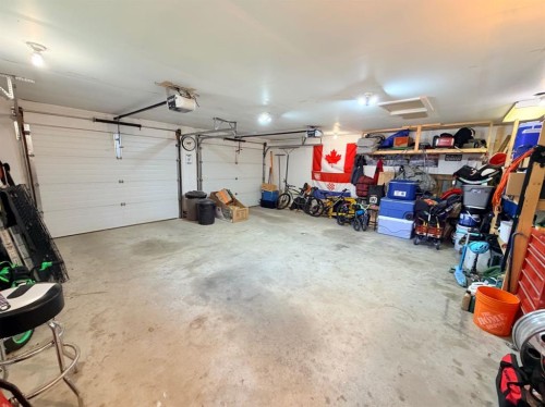 11 Lakhota Crescent West, Lethbridge, AB - Indoor Photo Showing Garage